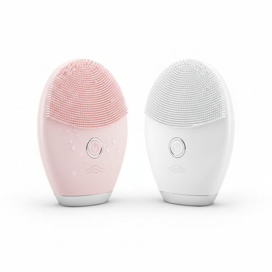 Electric sonic facial cleansing brush in pink with soft silicone bristles